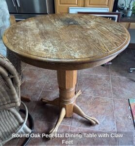 Round-Oak-Pedestal-Dining-Table-with-Claw-Feet
