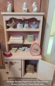 Vintage-Bunny-Figurines-and-Decorative-Boxes-on-Pastel-Pink-Shelf-Unit