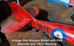 Vintage-Red-Biplane-Model-with-RAF-Roundel-and-Marking