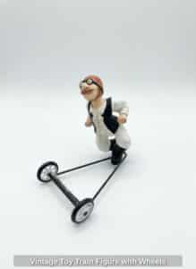 Vintage-Toy-Train-Figure-with-Wheels