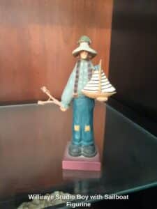 Williraye-Studio-Boy-with-Sailboat-Figurine
