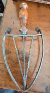 Antique-Trivet-with-Turned-Wooden-Handle