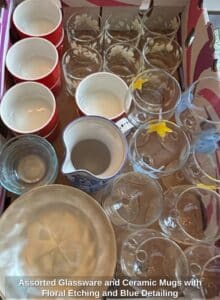 Assorted-Glassware-and-Ceramic-Mugs-with-Floral-Etching-and-Blue-Detailing