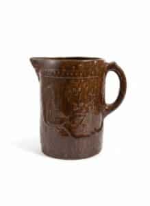 Bennington-Rockingham-Glaze-Pitcher-with-Embossed-Floral-Design