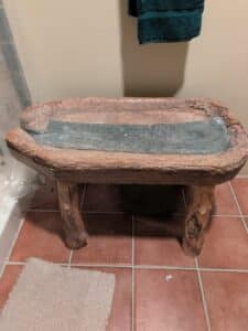 Rustic-Carved-Wood-and-Metal-Trough-Stool