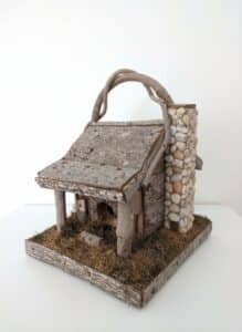 Rustic-Log-Cabin-Birdhouse-with-Twig-Handle-and-Stone-Chimney
