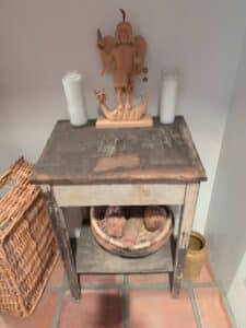 Rustic-Wooden-Side-Table-with-Carved-Figure