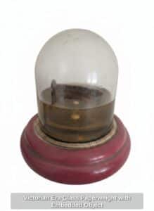 Victorian-Era-Glass-Paperweight-with-Embedded-Object