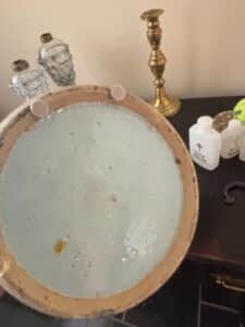 Vintage-Glass-Holy-Water-Bottles-with-Brass-Candlestick-and-Ceramic-Bowl
