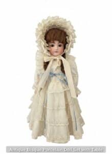 Antique-Bisque-Porcelain-Doll-Set-with-Table-second-image