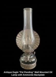 Antique-Eagle-Pat-Pending-Wall-Mounted-Oil-Lamp-with-Ammonite-Backplate