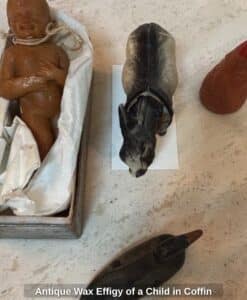 Antique-Wax-Effigy-of-a-Child-in-Coffin