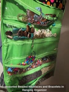 Assorted-Beaded-Necklaces-and-Bracelets-in-Hanging-Organizer