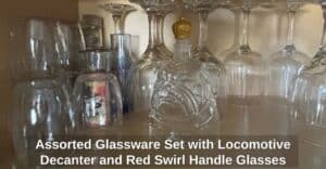 Assorted-Glassware-Set-with-Locomotive-Decanter-and-Red-Swirl-Handle-Glasses