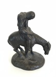 Bronze-Sculpture-of-a-Cowboy-on-a-Bucking-Horse-End-of-the-Trail