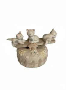 Ceramic-Kitten-Figurine-on-a-Well