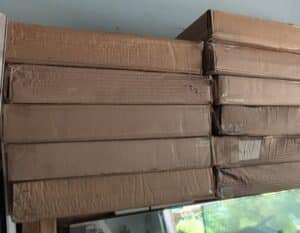 Deuces-Wild-Speed-Shop-Tin-Sign-and-Boxes-of-Unopened-Signs-second-image