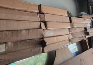 Deuces-Wild-Speed-Shop-Tin-Sign-and-Boxes-of-Unopened-Signs-third-image