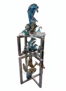 Dolphin-and-Wave-Sculpture-with-Glass-Shelves-Accent-Table