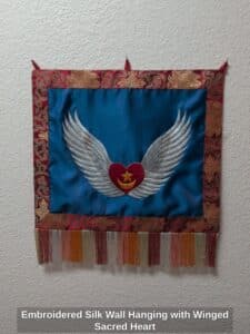 Embroidered-Silk-Wall-Hanging-with-Winged-Sacred-Heart