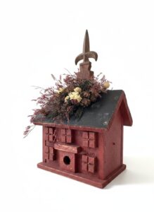 Rustic-Red-Log-Cabin-Birdhouse-with-Dried-Floral-Arrangement