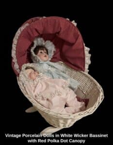 Vintage-Porcelain-Dolls-in-White-Wicker-Bassinet-with-Red-Polka-Dot-Canopy