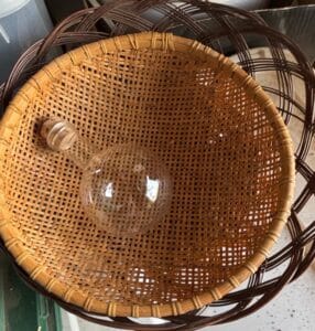 Vintage-Woven-Rattan-Basket-with-Glass-Decanter