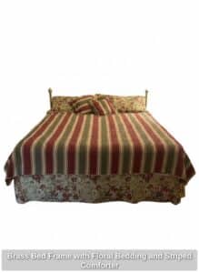 Brass-Bed-Frame-with-Floral-Bedding-and-Striped-Comforter