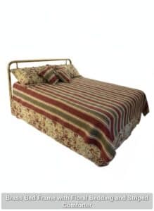 Brass-Bed-Frame-with-Floral-Bedding-and-Striped-Comforter-second-image