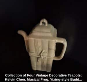 Collection-of-Four-Vintage-Decorative-Teapots-Kelvin-Chen-Musical-Frog-Yixing-style-Buddha-and-Bamboo-Relief-fourth-image