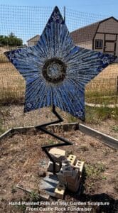Hand-Painted-Folk-Art-Star-Garden-Sculpture-From-Castle-Rock-Fundraiser