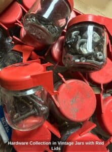 Hardware-Collection-in-Vintage-Jars-with-Red-Lids-second-image