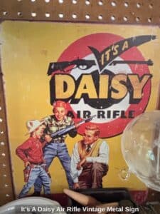 Its-A-Daisy-Air-Rifle-Vintage-Metal-Sign-second-image