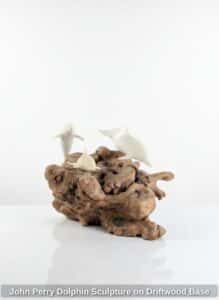 John-Perry-Dolphin-Sculpture-on-Driftwood-Base