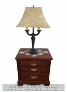 Traditional-Cherry-Finish-Three-Drawer-Nightstand-with-Ornate-Brass-Toned-Pulls-and-Table-Lamp