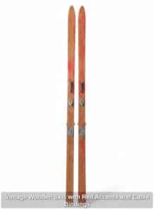 Vintage-Wooden-Skis-with-Red-Accents-and-Cable-Bindings