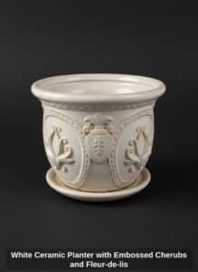 White-Ceramic-Planter-with-Embossed-Cherubs-and-Fleur-de-lis