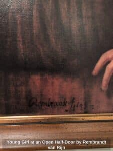 Young-Girl-at-an-Open-Half-Door-by-Rembrandt-van-Rijn-second-image
