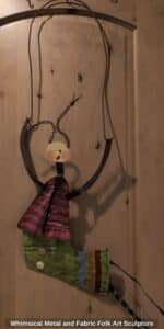 Whimsical-Metal-and-Fabric-Folk-Art-Sculpture
