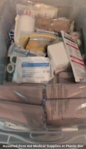 Assorted-First-Aid-Medical-Supplies-in-Plastic-Bin