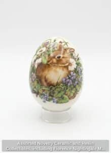 Assorted-Novelty-Ceramic-and-Resin-Collectibles-including-Florence-Nightingale-Mug-and-Bunny-Themed-Easter-Eggs-second-image