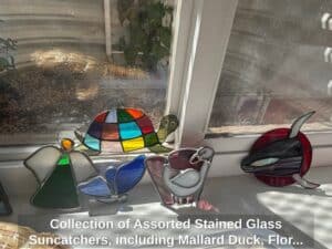 Collection-of-Assorted-Stained-Glass-Suncatchers-including-Mallard-Duck-Floral-Mushroom-Southwestern-Steer-Skull-and-Eagle-Turtle-Butterfly-Bird-and-Orca-fifth-image