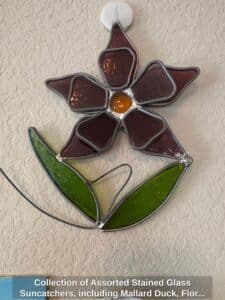 Collection-of-Assorted-Stained-Glass-Suncatchers-including-Mallard-Duck-Floral-Mushroom-Southwestern-Steer-Skull-and-Eagle-Turtle-Butterfly-Bird-and-Orca-second-image