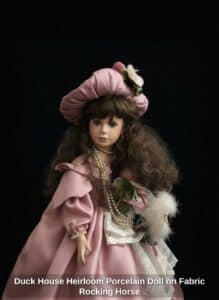 Duck-House-Heirloom-Porcelain-Doll-on-Fabric-Rocking-Horse-third-image