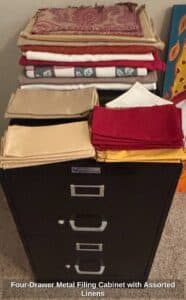 Four-Drawer-Metal-Filing-Cabinet-with-Assorted-Linens