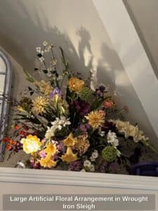 Large-Artificial-Floral-Arrangement-in-Wrought-Iron-Sleigh
