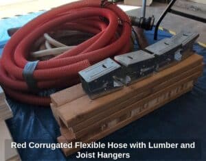 Red-Corrugated-Flexible-Hose-with-Lumber-and-Joist-Hangers