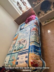 Twin-Bed-with-Star-Quilt-and-Coastal-Theme-Bedding-second-image