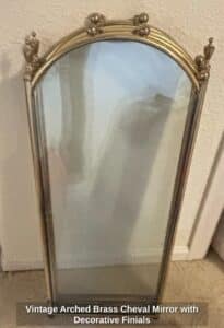 Vintage-Arched-Brass-Cheval-Mirror-with-Decorative-Finials