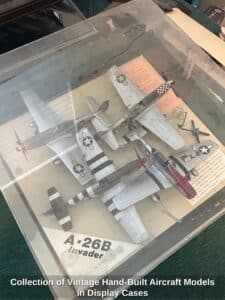 Collection-of-Vintage-Hand-Built-Aircraft-Models-in-Display-Cases